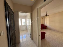 Kuşadası Güzelçamlı'da Satılık 2+1 Ayrı Mutfak Ara Kat Daire