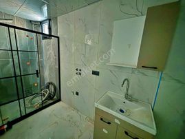 Uytundan Burhaniye Merkez'de Açık Mutfak 2+1 Satılık Daire