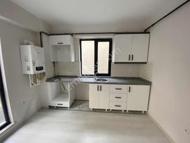 Ana Cadde Dibi Yeni Bina'da 1+1 Sıfır Daire