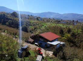 Kuzuluk Topçusırtı'nda Geniş Bahçeli, Keyifli Ev!