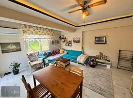 Kerim'den Küçükkuyu Merkez'de 1+1 Geniş Satılık Daire