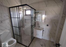 Ayvacık Hamdibey Mahallesinde Çamlık Bölgesi Satılık 2+1 Daire