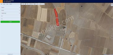 Kütahya Merkezde Yol Kenarı Tel Örgülü 2081 M² Müstakil Arsa