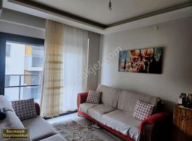 Davutlar'da Site İçerisinde Çok Güzel Konumda Satılık 1+1 Daire