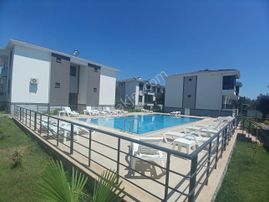 Havuzlu Sitede Yüksek Giriş 2+1 Ayrı Mutfaklı Daire