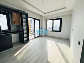 Win'den Tece'de Merkezi Konum Deniz Manzaralı Satılık 1+1 Daire