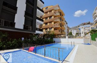 Hurma'da Pazar Yakını Havuzlu Satılık 2+1 Arakat Daire