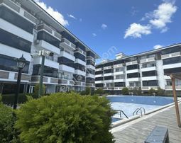 Karaca'dan Kumbağ Mah.havuzlu Site İçerisinde Kiralık 1+1 Daire