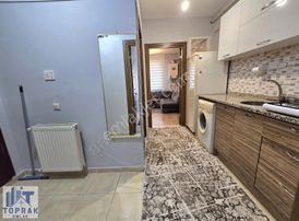 Toprak Emlak'tan Güzel Konumda Kiralık Eşyalı Kullanışlı 1+1