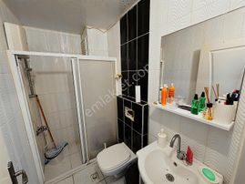 Tüzün'den Çiftlikköy'de 2+1 Eşyalı Satılık Daire