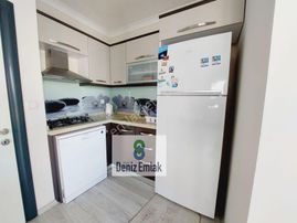 Denizden Akçayda Öncephe Asansörlü Yeni Binada Eşyalı Satılık 1+1 Daire..