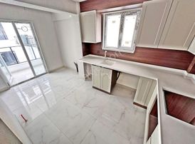 Keçiören'de_yeni_bina_kat_konumlu_altı_üstü_daire_geniş_2+1_