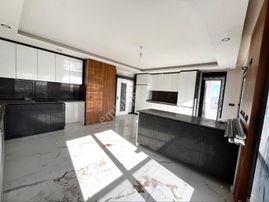 V. Karşıyaka Mah.tek Daire Üzeri 2 Ebeveyn Banyosu 2 Giyinme Odası Teraslı 3+1 Daire