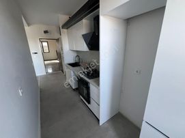 İncek Taşpınar'da Site İçerisi Büyük Tip 1+1 Kiralık Daire