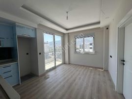 Ertuğrul'dan Ara Kat Deniz Manzaralı 1+1 Satılık Daire