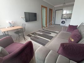 Atıcı'dan Belediye Yanında Kiracılı Eşyalı 1+1 Satılık Daire