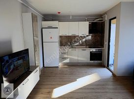 Özden Gayrimenkul'den Çıtlakkale Nevahan Evlerinde Kiralık 1+1