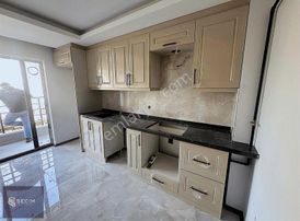 Seçim Emlak'tan Arama Sokak'ta 3+1 Ara Kat Sıfır Daire