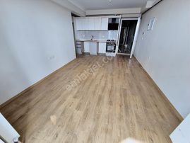 Arel'den Bahçelievler'de 1 Kat Yeni Bina Kombili Yan Cephe 1+1