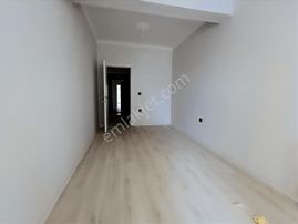 Sancak Emlaktan Kemalpaşada Sıfır 1+1 Daire