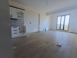 Sancak Emlaktan Gomecte Ful Deniz Manzaralı 2+1 A.mutfak Daire..