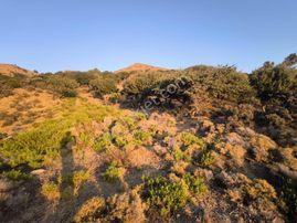 İmroz Emlak'tan Mesadi Mevkii'de 496 M2 Deniz Manzaralı Arazi