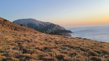 İmroz Emlak'tan Mesadi Mevkii'de 850 M2 Deniz Manzaralı Arazi