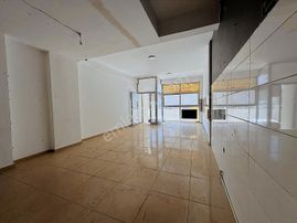 Karşıyaka Örnekköy'de Yatırımlık Cadde Üzeri 70m2 Bacalı Dükkan