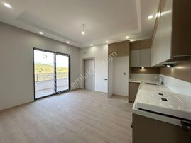 ▓ Yükselden Satılık Edremit'te Yerden Isıtmalı Arakat Sıfır Lux 2+1 Daire