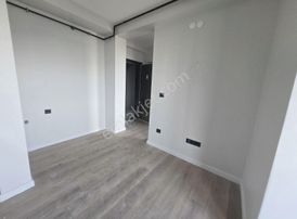 Erlife'den Büyükoyumcada Deniz Manzaralı 1+1 Daire...