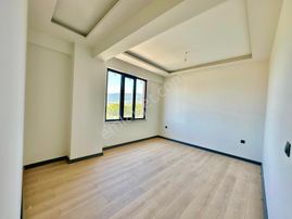 Kostak Gayrimenkulden Zeytinlide Ön Cephe Arakat Sıfır 1+1 Daire