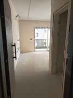 Stop’tan Tuzla Mahallesi'nde Ara Kat Yerden Isıtmalı Asansörlü 2+1