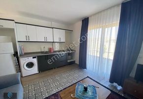 Ayvalık Küçüköy'de Yuzme Havuzlu 1+1 İle 2+1 Taş Mimari Daireler