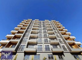 Limonlu'da Site İçerisinde Deniz Manzaralı 3 Cepheli 1+1 Daire