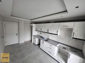 Karşıyaka'nın Kalbinde Satılık Sıfır Daire | 90 M² Konfor