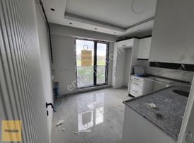 Karşıyaka'nın Kalbinde Satılık Sıfır Daire | 90 M² Konfor