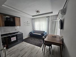 Karınca'dan Tecede Havuzlu Doğalgazlı Denize Yakın 1+1 Eşyalı