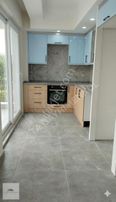 Finike İnönü Caddesi'nde Yeni Binada Kiralık 2+1 Daire