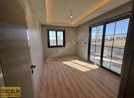 Özçelik'den ** Çınarlı **'da Satılık 7+1 Triplex Villa