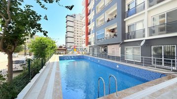 Kızkalesinde Eşyalı 1+1 Satılık Daire