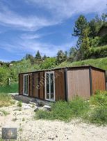 Muğla Menteşe'de İçerisinde Prefabrik Ev Bulunan Satılık Arsa