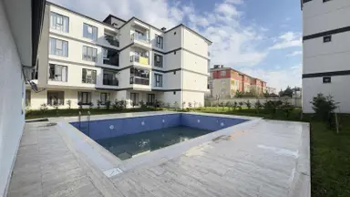 Villalar Bölgesinde 1+1 Site İçerisinde Havuzlu Daire