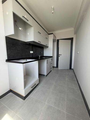 Rumeli Mahallesi'nde Merkezi Konumda Geniş 1+1 Satılık Daire