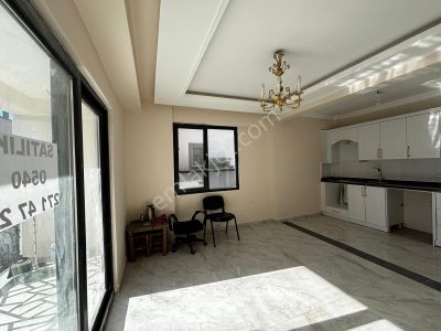 Dalamanda Dost Emlaktan Karaçalıda Kapalı Mutfak 1+1 Satılık Daire