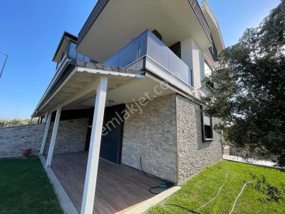 Poyraz Gayrimenkul'den Güre Çamlıbel'de Satılık Sıfır 6+1 Villa