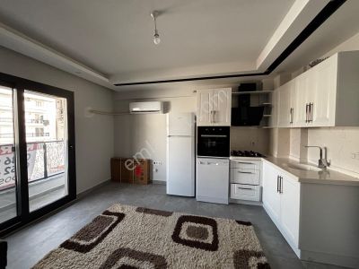 Dost Emlaktan Karaçalıda Asansörlü Eşyalı Sıfır 1+1kiralık Daire