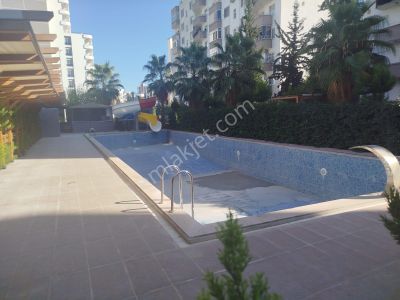 Karınca'dan Tece'de Havuzlu Sitede, Eşyalı 1+1 Satılık Daire!!