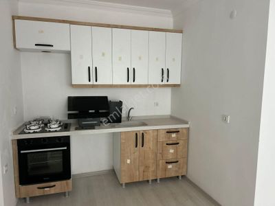 Yükselden Satılık Edremit Turhanbeyde Kaçmaz Fırsat Asansörlü 1+1 Daire