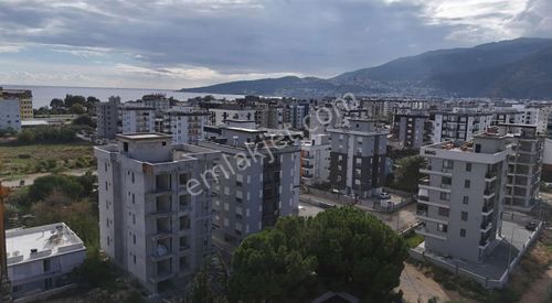 07 Truva Emlaktan Finike Sahilde Denize Yakın Geniş 1+1 Satılık