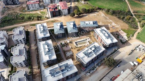 Torbalı Kipa'ya Komşu Havuzlu Güvenlikli Sitede Sıfır 2+1..